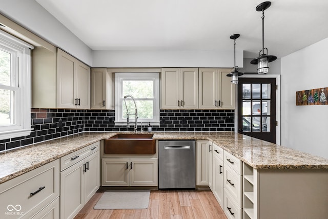 10198 N State Road 75, North Salem, IN 46165 - kitchen featuring dishwasher, a peninsula, light wood-style floors, backsplash, and hanging light fixtures
