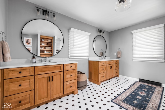10198 N State Road 75, North Salem, IN 46165 - bathroom featuring two vanities and baseboards