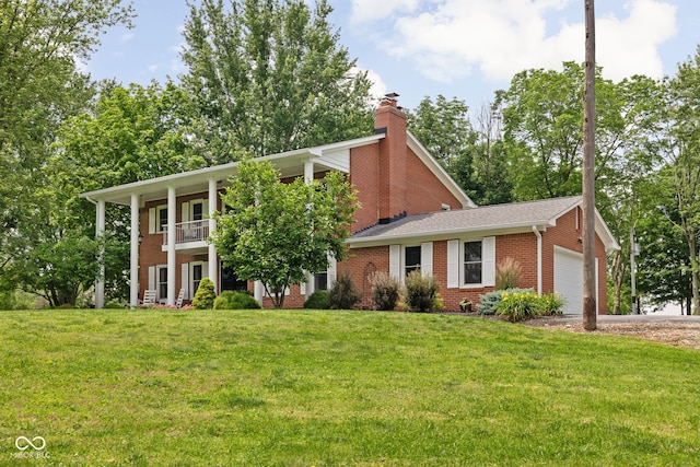 10198 N State Road 75, North Salem, IN 46165 - view of front facade featuring an attached garage, brick siding, a front lawn, and a balcony