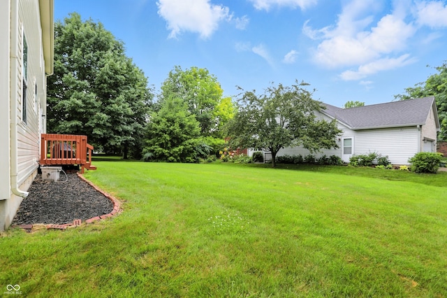 13264 Penneagle Dr, Carmel, IN 46033 - view of grassy yard featuring a wooden deck