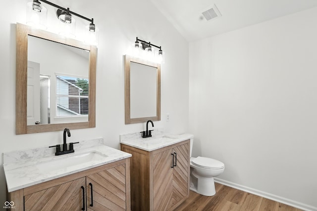 13264 Penneagle Dr, Carmel, IN 46033 - full bath with wood finished floors, two vanities, and lofted ceiling