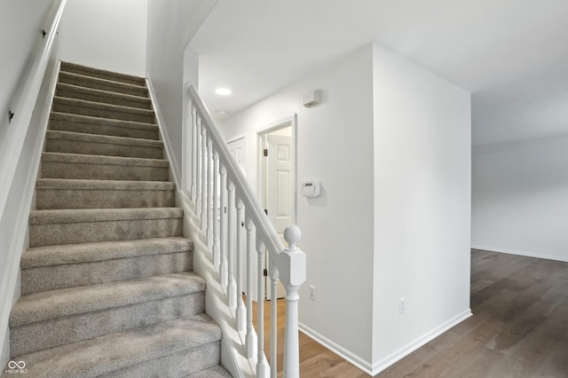 13264 Penneagle Dr, Carmel, IN 46033 - stairs featuring wood finished floors and recessed lighting