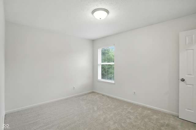 13264 Penneagle Dr, Carmel, IN 46033 - unfurnished room with light colored carpet and a textured ceiling