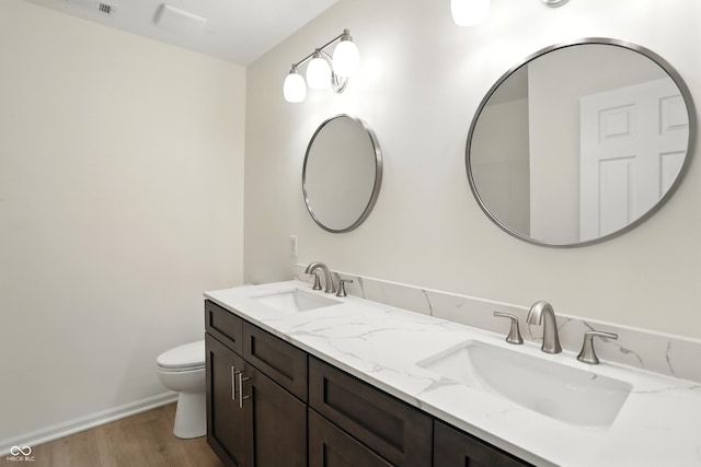 13264 Penneagle Dr, Carmel, IN 46033 - bathroom with wood finished floors and double vanity