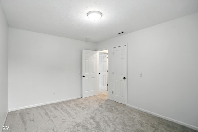 13264 Penneagle Dr, Carmel, IN 46033 - unfurnished bedroom with carpet and a textured ceiling