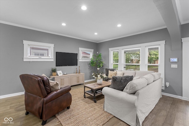 1141 W 35th St, Indianapolis, IN 46208 - living room featuring recessed lighting, light wood-style flooring, and ornamental molding