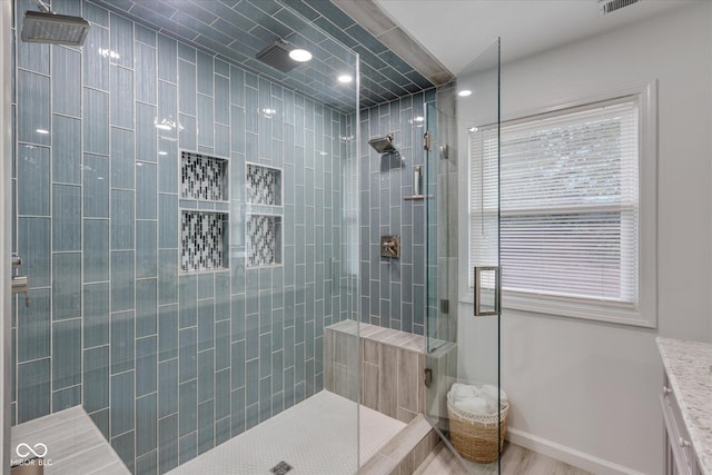 1141 W 35th St, Indianapolis, IN 46208 - bathroom with a tile shower, vanity, and recessed lighting