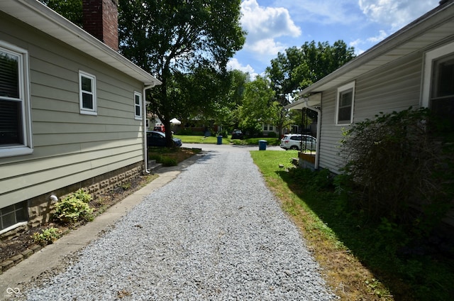 4930 Primrose Ave N, Indianapolis, IN 46205 - view of yard featuring gravel driveway