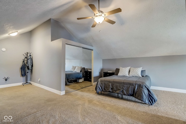 2332 Central Ave, Indianapolis, IN 46205 - carpeted bedroom featuring a textured ceiling, lofted ceiling, a closet, and a ceiling fan