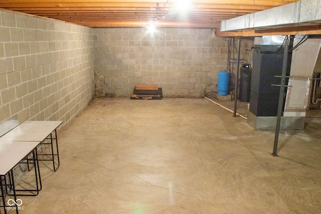 3401 N 75 W, Cayuga, IN 47928 - unfinished basement featuring a water pressure tank and heating unit