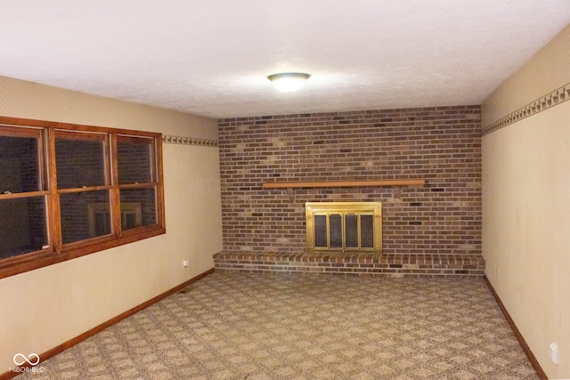 3401 N 75 W, Cayuga, IN 47928 - unfurnished living room featuring a fireplace and carpet flooring