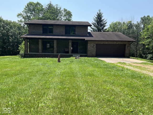 3401 N 75 W, Cayuga, IN 47928 - view of front of property featuring driveway, brick siding, a garage, and covered porch