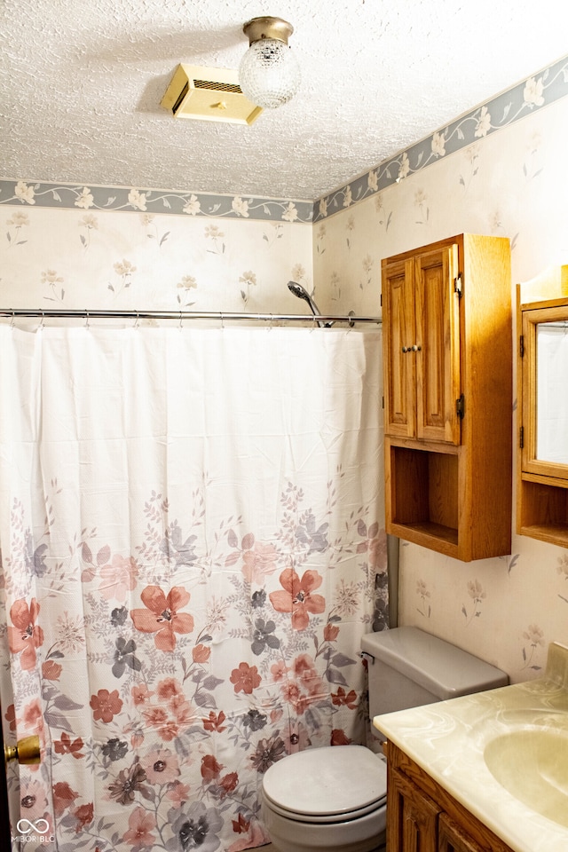 3401 N 75 W, Cayuga, IN 47928 - bathroom with vanity, wallpapered walls, a textured ceiling, and curtained shower