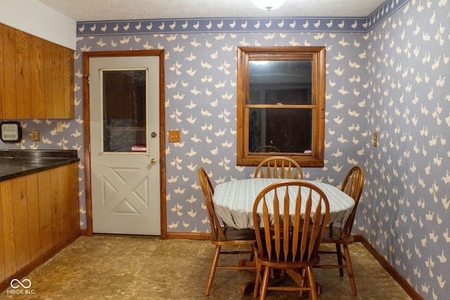 3401 N 75 W, Cayuga, IN 47928 - dining room with wallpapered walls and a textured ceiling