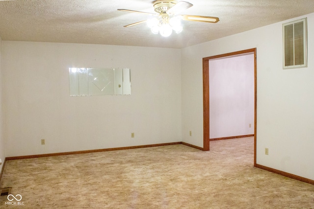 3401 N 75 W, Cayuga, IN 47928 - empty room with light carpet, a ceiling fan, and a textured ceiling