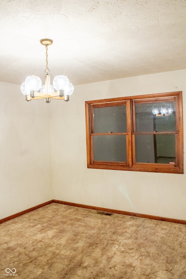 3401 N 75 W, Cayuga, IN 47928 - carpeted empty room with a chandelier and baseboards