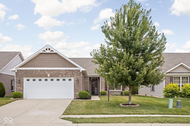 1418 Blackthorne Trl S, Plainfield, IN 46168 - view of front facade with brick siding, a garage, driveway, a front yard, and roof with shingles