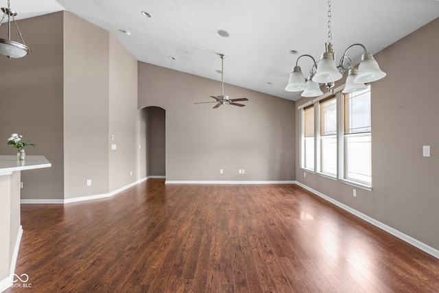 1418 Blackthorne Trl S, Plainfield, IN 46168 - unfurnished room featuring arched walkways, a chandelier, a ceiling fan, dark wood finished floors, and high vaulted ceiling