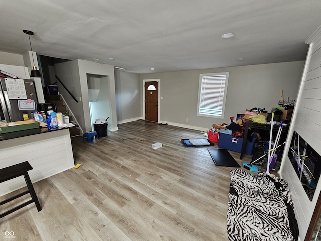 3836 N Wittfield St, Indianapolis, IN 46235 - recreation room featuring light wood-style floors, heating unit, and recessed lighting