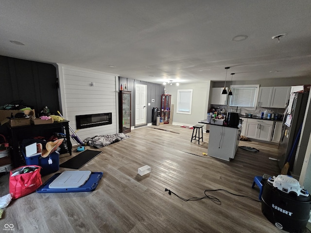 3836 N Wittfield St, Indianapolis, IN 46235 - living room with wood finished floors and a fireplace