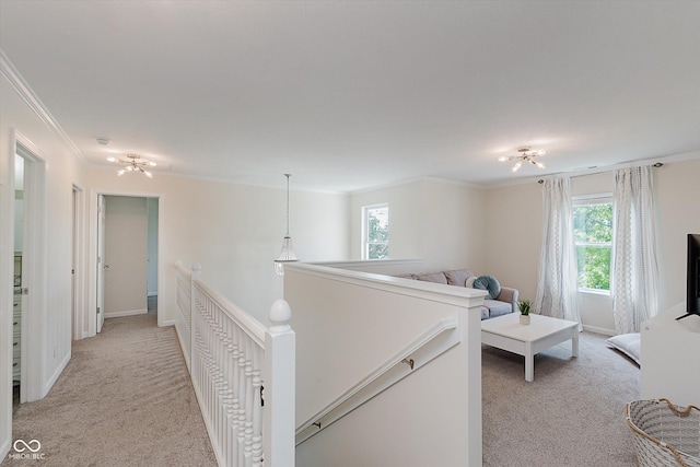 6036 W Bayfront Shrs, Mccordsville, IN 46055 - hallway featuring light carpet, crown molding, and an upstairs landing