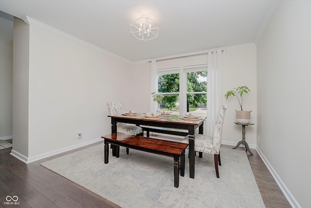 6036 W Bayfront Shrs, Mccordsville, IN 46055 - dining space with a chandelier, wood finished floors, and crown molding