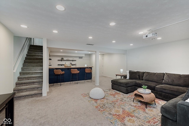 6036 W Bayfront Shrs, Mccordsville, IN 46055 - living room featuring light carpet, wet bar, recessed lighting, and stairs