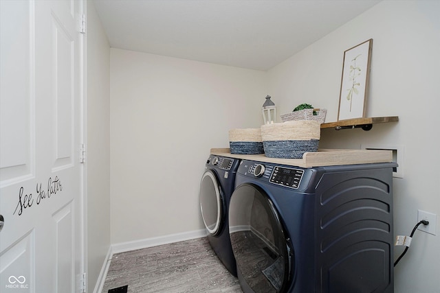 6036 W Bayfront Shrs, Mccordsville, IN 46055 - laundry room featuring washer and dryer and wood finished floors