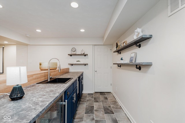 6036 W Bayfront Shrs, Mccordsville, IN 46055 - kitchen featuring blue cabinetry, beverage cooler, light countertops, open shelves, and recessed lighting