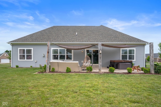 6420 Colt Ln, Anderson, IN 46013 - back of property featuring a hot tub, a patio, and roof with shingles