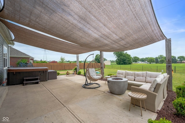 6420 Colt Ln, Anderson, IN 46013 - fenced backyard featuring a hot tub, a patio, and an outdoor living space with a fire pit