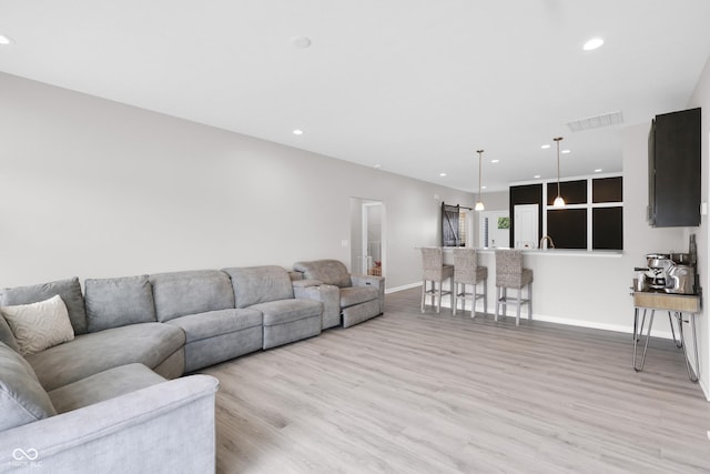757 Carson Ln, Greenfield, IN 46140 - living area featuring light wood-style floors and recessed lighting