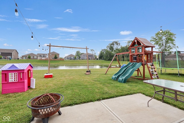 757 Carson Ln, Greenfield, IN 46140 - view of play area featuring a lawn, a water view, a patio area, a residential view, and an outdoor fire pit