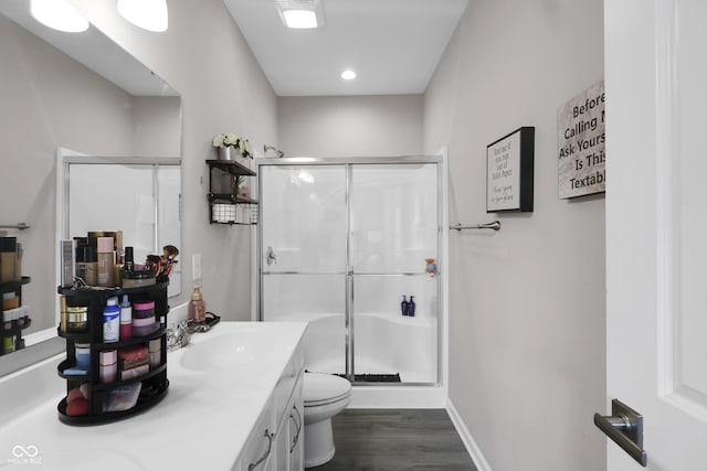 757 Carson Ln, Greenfield, IN 46140 - bathroom featuring a shower stall, wood finished floors, vanity, and recessed lighting