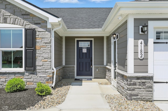 4182 Hume Ave, Plainfield, IN 46168 - doorway to property with stone siding and a shingled roof