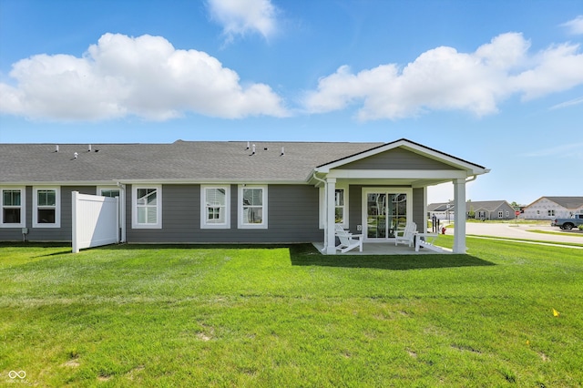 4182 Hume Ave, Plainfield, IN 46168 - rear view of house featuring a patio, roof with shingles, and a yard