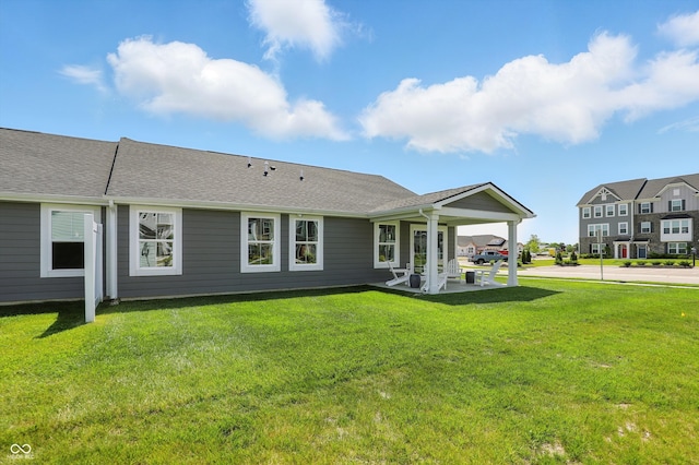4182 Hume Ave, Plainfield, IN 46168 - rear view of property with a lawn and a shingled roof