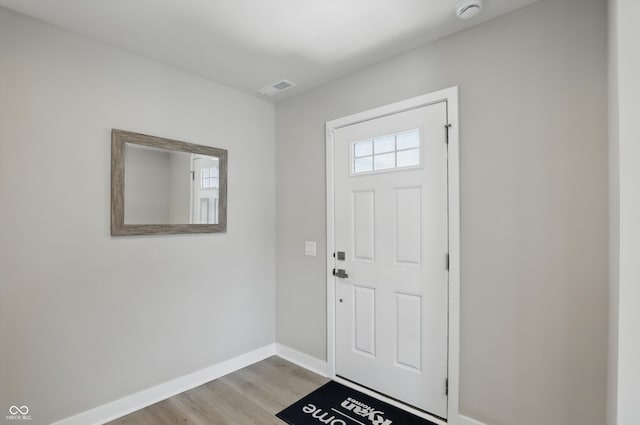 4182 Hume Ave, Plainfield, IN 46168 - foyer with baseboards and light wood-style floors