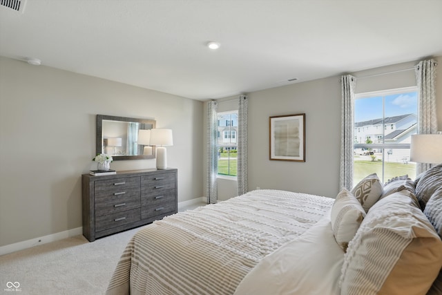 4182 Hume Ave, Plainfield, IN 46168 - bedroom with multiple windows and light colored carpet