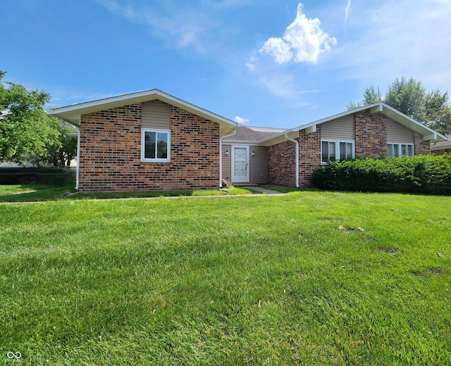 3415 Winchester Dr, Indianapolis, IN 46227 - ranch-style home featuring brick siding and a front lawn