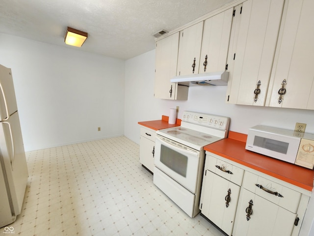 3415 Winchester Dr, Indianapolis, IN 46227 - kitchen with white appliances, under cabinet range hood, light flooring, white cabinets, and a textured ceiling