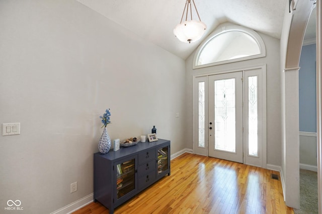 5720 Hickory Hollow Dr, Plainfield, IN 46168 - entryway with lofted ceiling and light wood-style flooring
