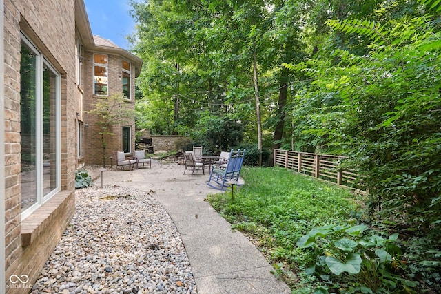 5720 Hickory Hollow Dr, Plainfield, IN 46168 - fenced backyard with a patio
