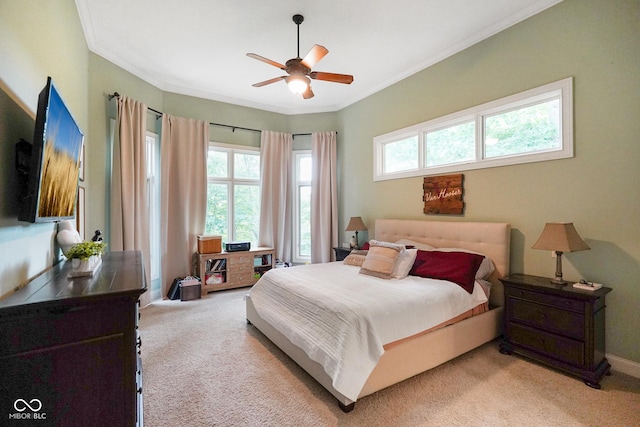 5720 Hickory Hollow Dr, Plainfield, IN 46168 - bedroom with light colored carpet, multiple windows, ornamental molding, and ceiling fan