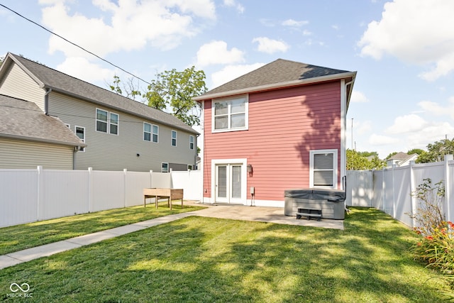 2015 N College Ave, Indianapolis, IN 46202 - back of house with a hot tub, french doors, a patio, and a fenced backyard