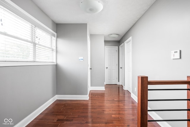 2015 N College Ave, Indianapolis, IN 46202 - corridor with wood finished floors, an upstairs landing, and a textured ceiling