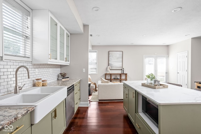 2015 N College Ave, Indianapolis, IN 46202 - kitchen with built in microwave, dishwasher, dark wood-style floors, decorative backsplash, and healthy amount of natural light