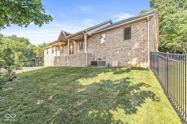 3766 Brill Rd, Indianapolis, IN 46227 - view of property exterior featuring a fenced backyard and brick siding