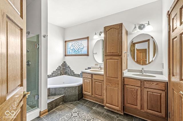3766 Brill Rd, Indianapolis, IN 46227 - bathroom with a garden tub, double vanity, a shower stall, and tile patterned flooring