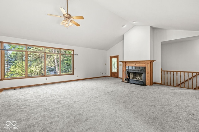 3766 Brill Rd, Indianapolis, IN 46227 - unfurnished living room featuring high vaulted ceiling, carpet, a ceiling fan, plenty of natural light, and a fireplace with flush hearth
